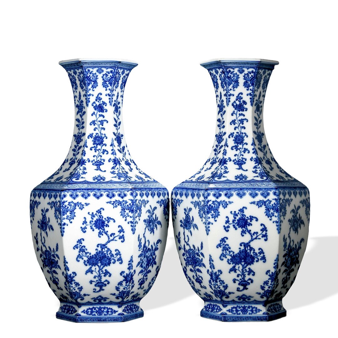 A pair of blue and white hexagonal vases